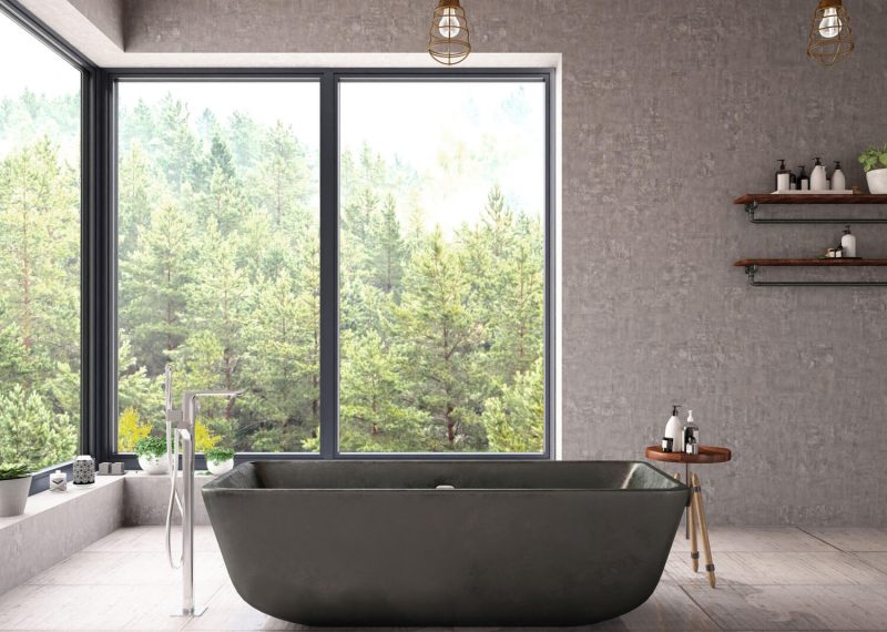 Bath in front of large aluminium windows - Blue Light Windows
